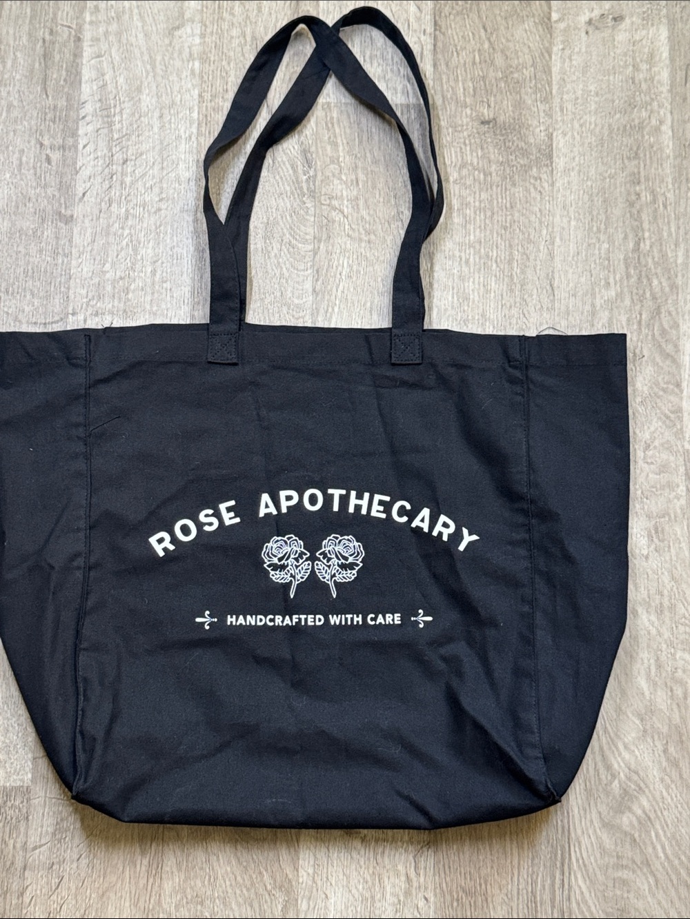 Schitt’s Creek Merch. Rose Apothecary Black Canvas Tote